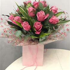 12 Pink Roses Handtied in a Bag