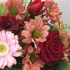  Florist Choice Handtied with a Single Red Rose